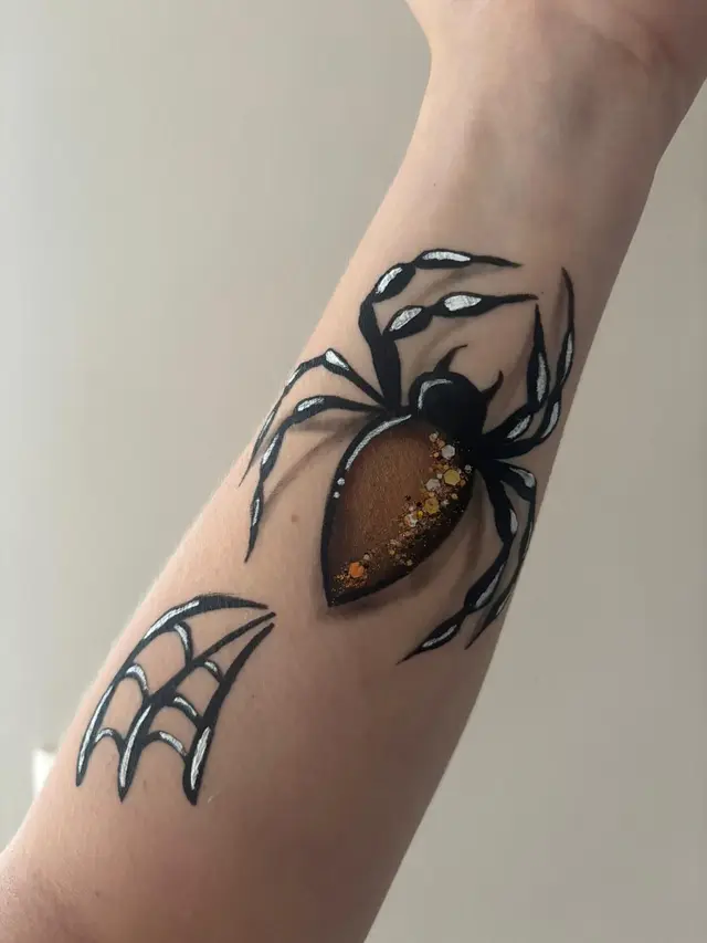 Spin op de arm